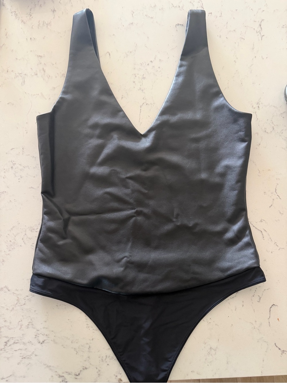Black Pleather V-Neck One-Piece Bodysuit